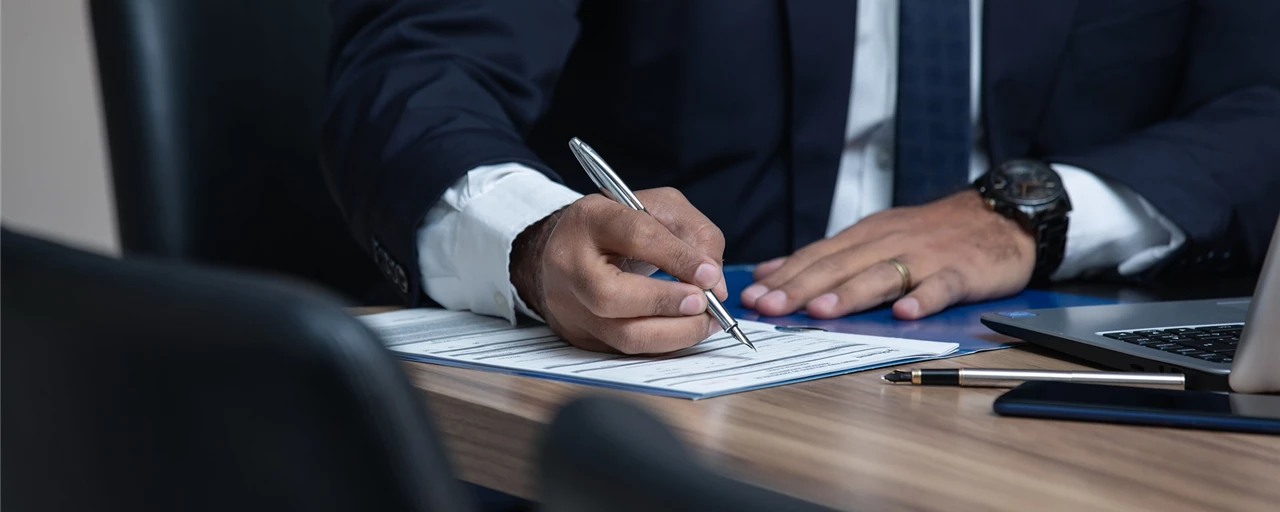 Lawyer Writing on Notepad